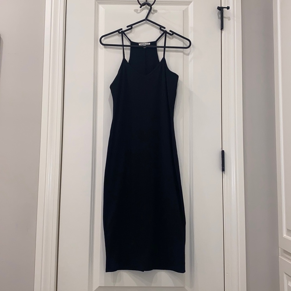 Skin tight black stress with spaghetti straps